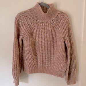 Pink turtleneck sweater